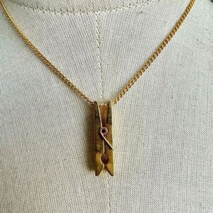 Gold tone clothes pin pendant necklace